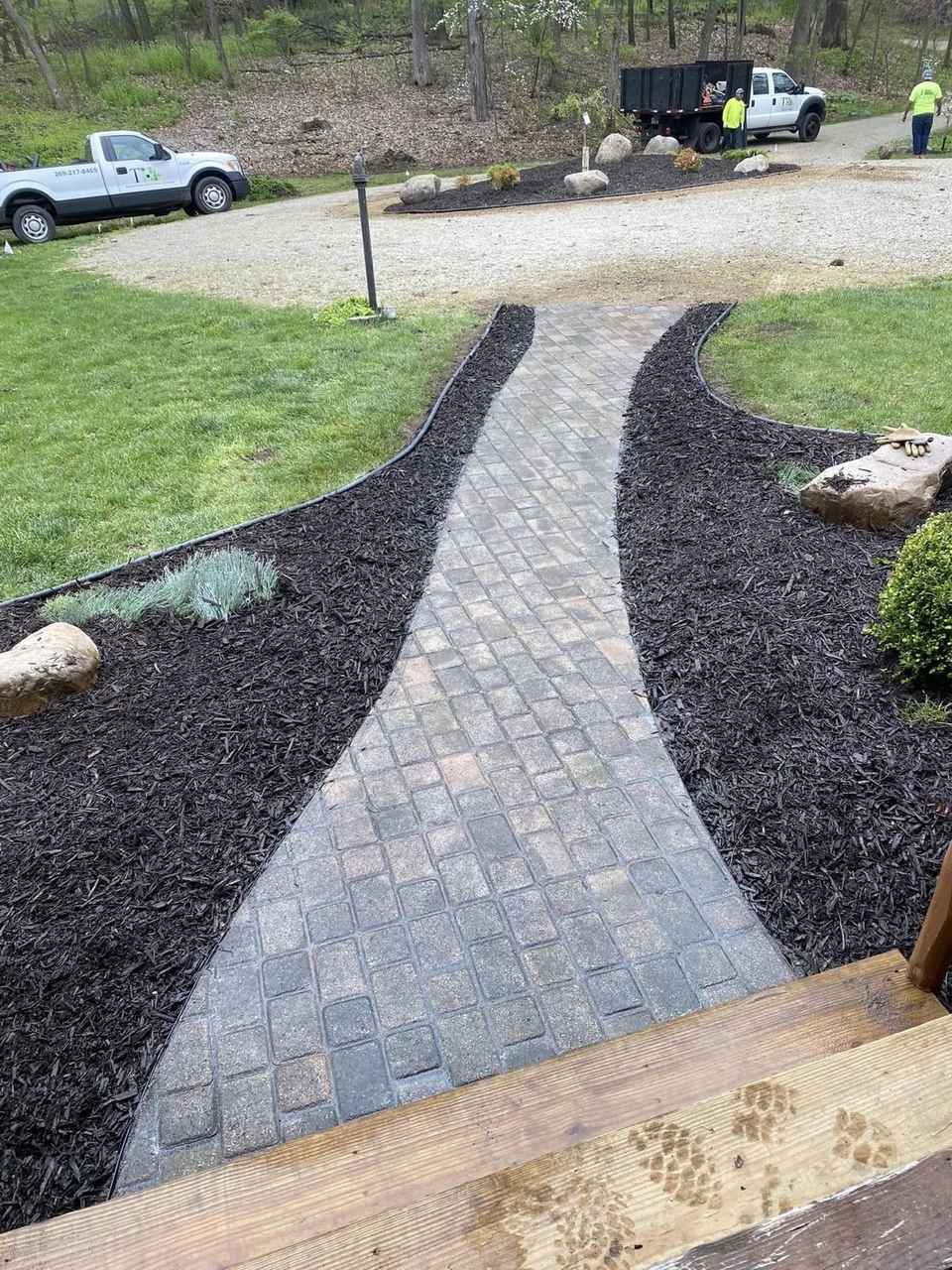 Stone walkway and landscaping in a Portage yard